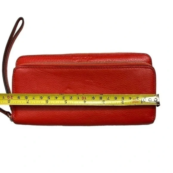 Coach orangy red leather double zipper wristlet clutch bag